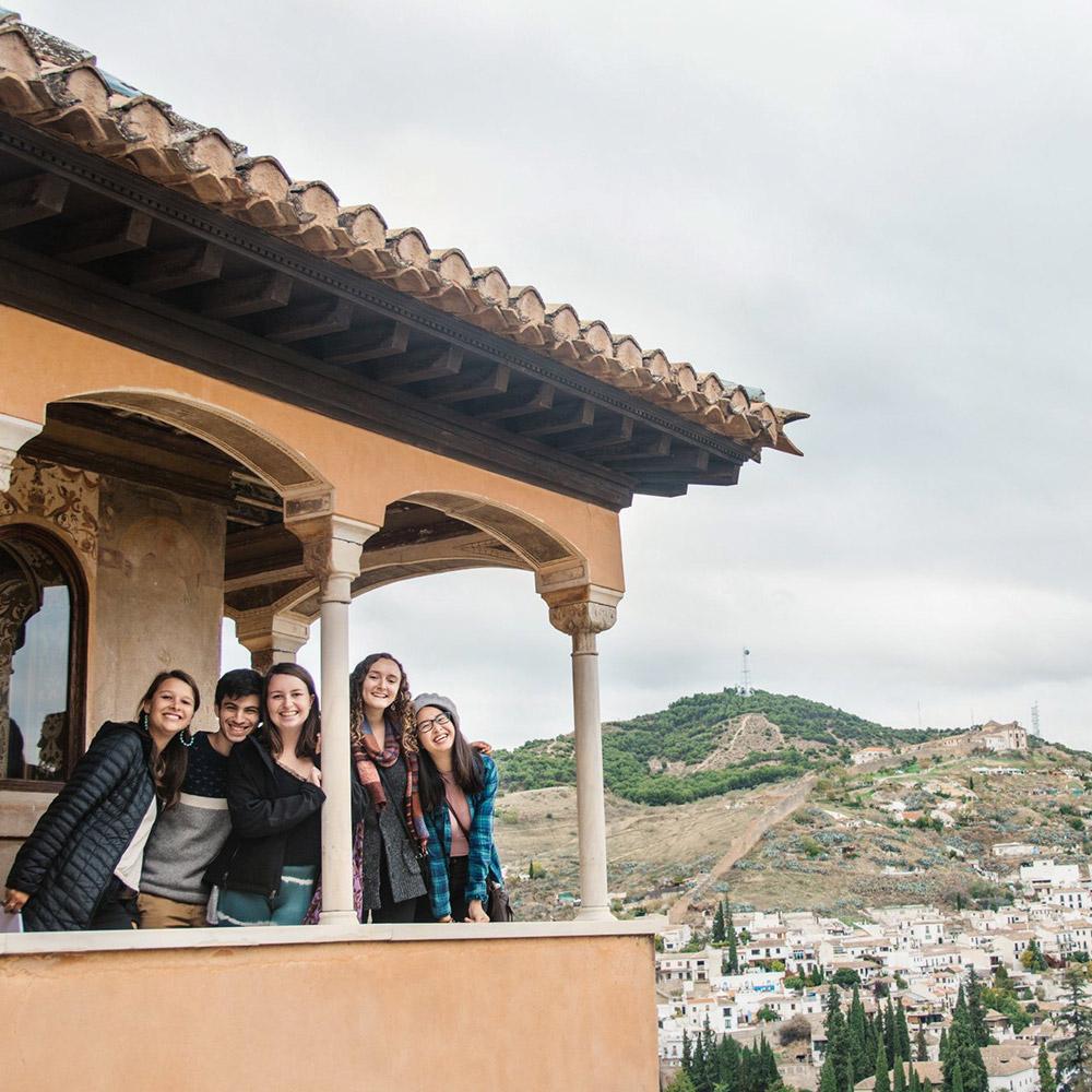 Study abroad students on a balcony